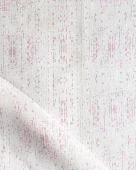 A pink and white Omaha Kinship Fabric with dots on it, in Eskayel's high-end Omaha Kinship pattern