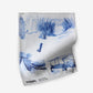 A blue and white Out East Fabric Cobalt with a toile pattern featuring a picture of a boat