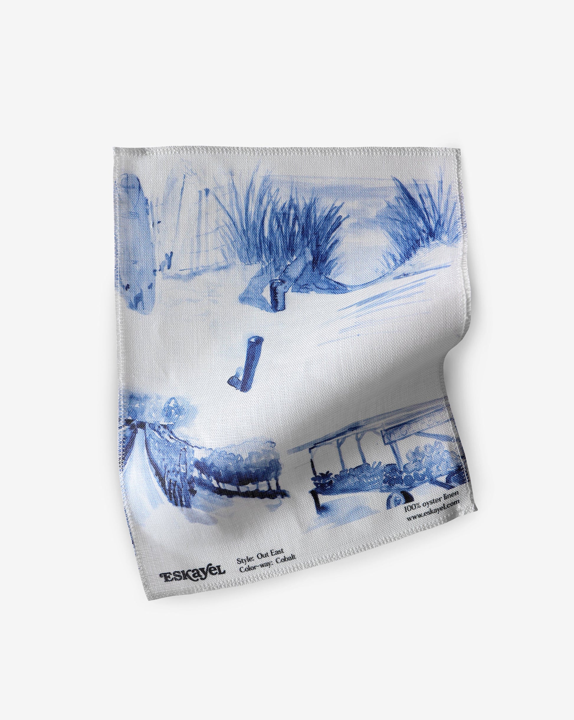A blue and white Out East Fabric Cobalt with a toile pattern featuring a picture of a boat