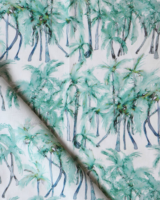 A luxurious Palm Dance Fabric Pool with a watercolor pattern of palm trees on it