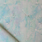 A piece of Pecosa Fabric with a blue and white pattern on it