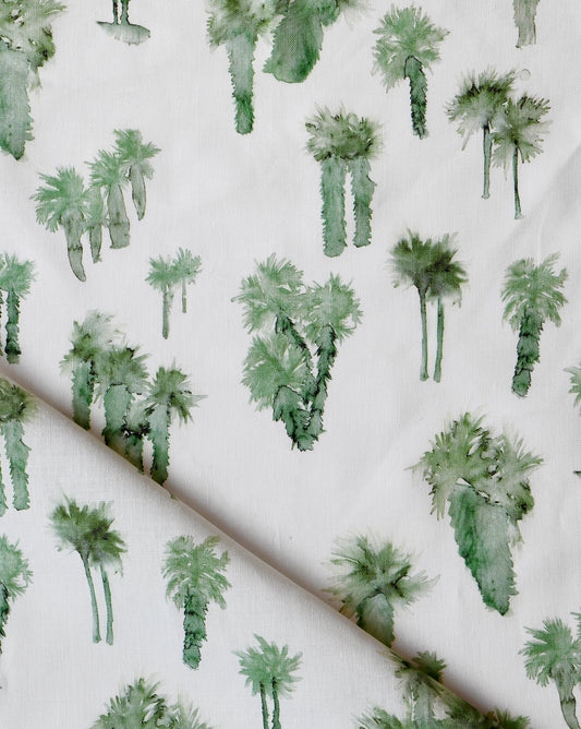 A Perfect Palm Fabric with green palm trees in a watercolor style