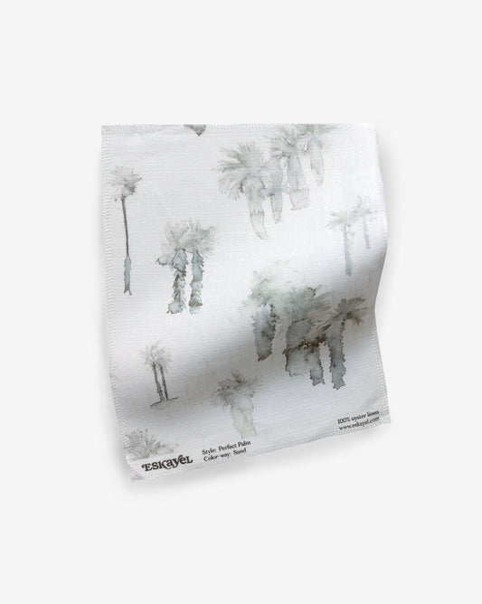 A Perfect Palm Fabric Sample Sand with palm trees on it