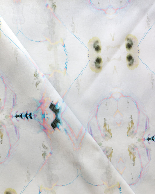 A close up of a white Polar Pedigree Fabric Sand with a graphic pattern