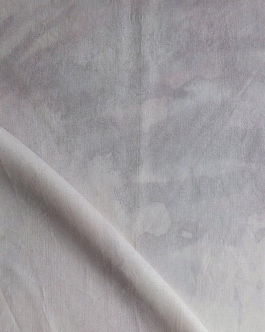 A close up of the Reflettere Fabric Alba in shades of white and gray
