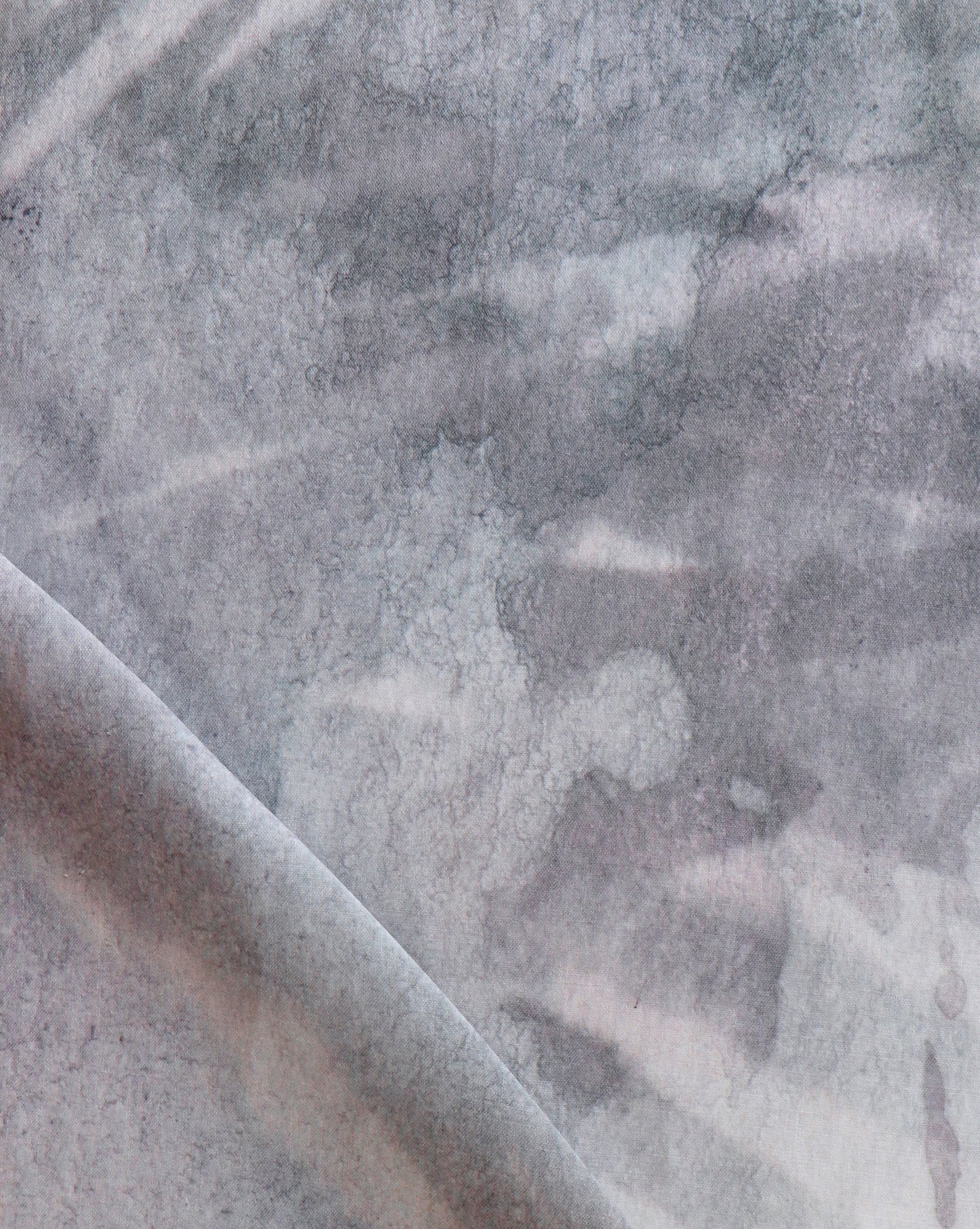 A close up of the Reflettere Fabric||Notte in a moody colorway.