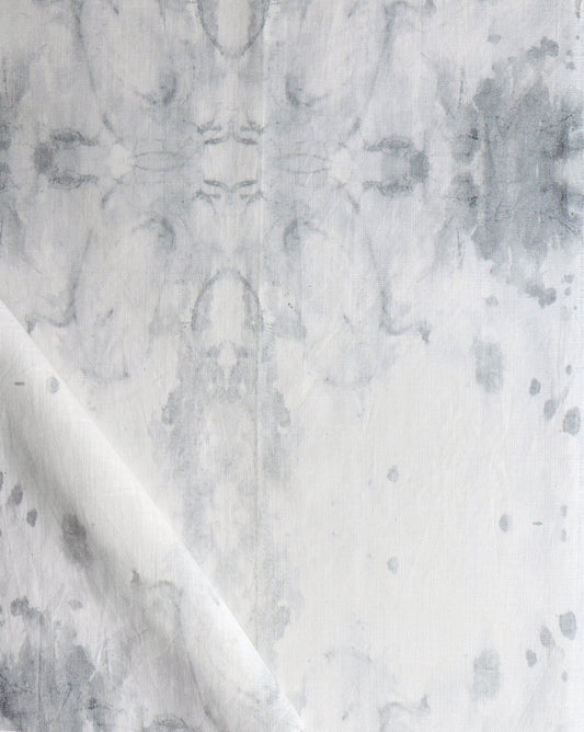 A close up of a Roman Ram Fabric Greyscale pillow, part of the Era Collection