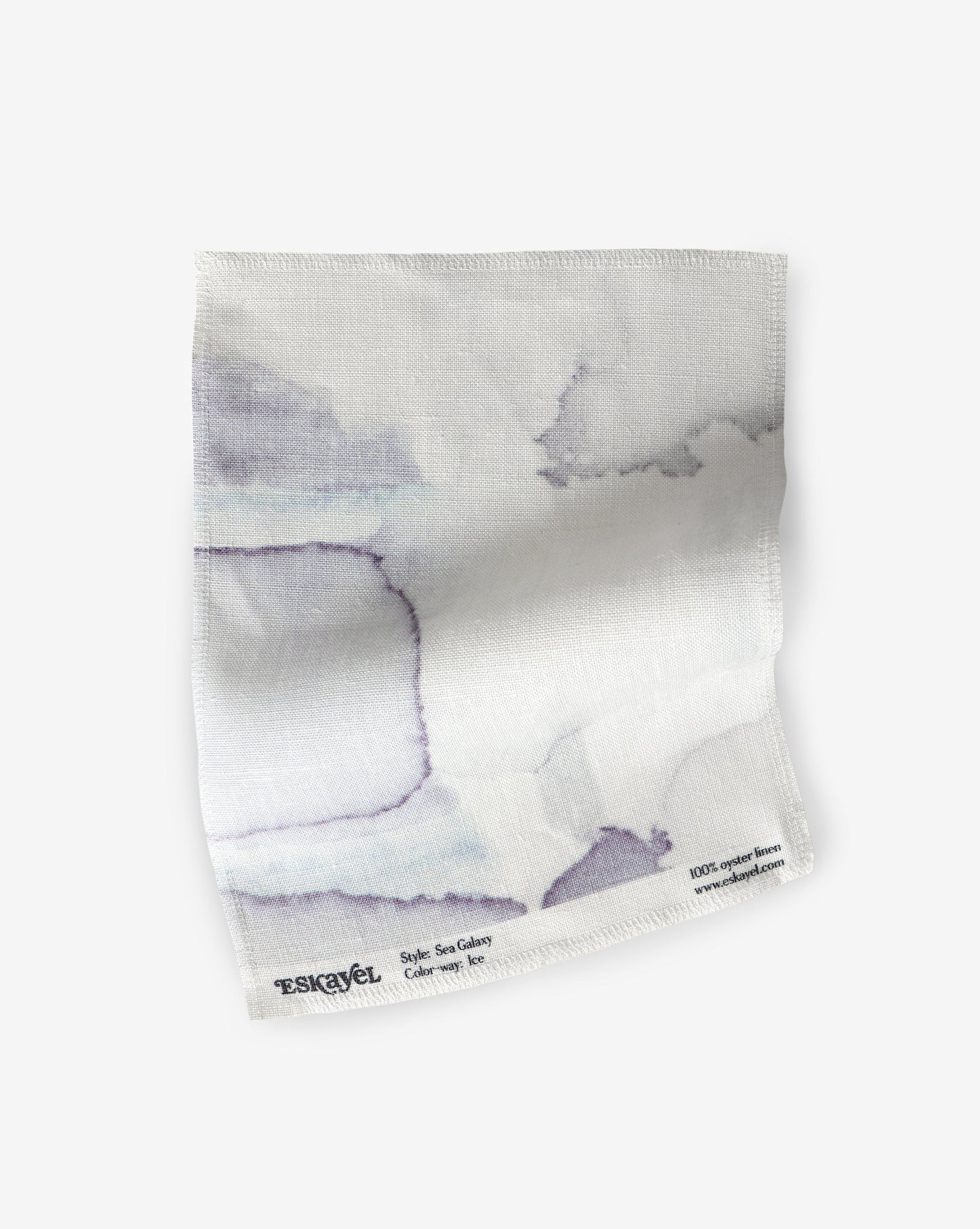 A purple and white design on a hand fabric featuring Sea Galaxy Fabric Ice drapes