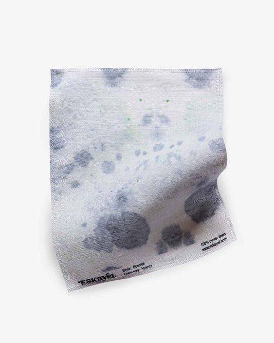 A Species Fabric Sample with black spots on it can be ordered as a sample