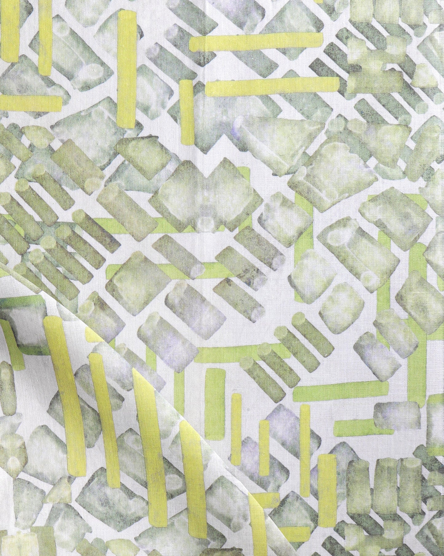 A luxury high-end Stele Fabric Citrus pattern in green and yellow on a white background