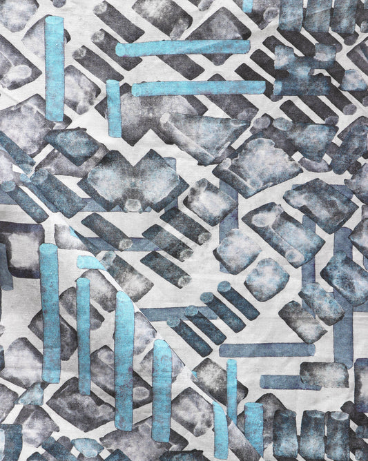 A blue and white abstract pattern on a Stele Fabric Perigean with luxury high-end geometric patterns