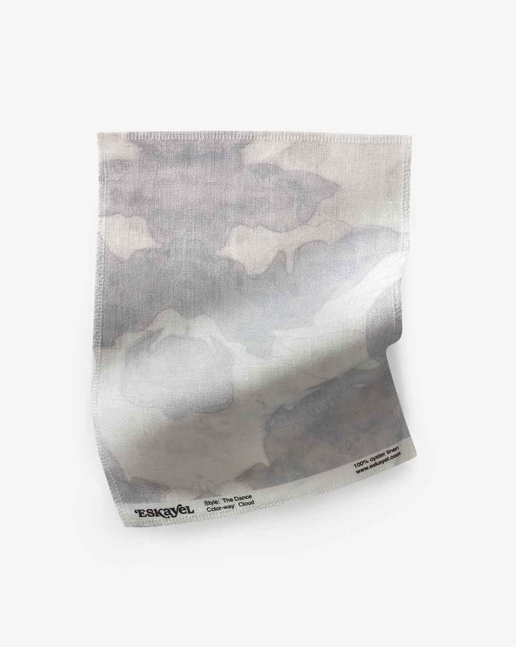 An image of a grey and white fabric on a white surface from The Dance Fabric Cloud Collection