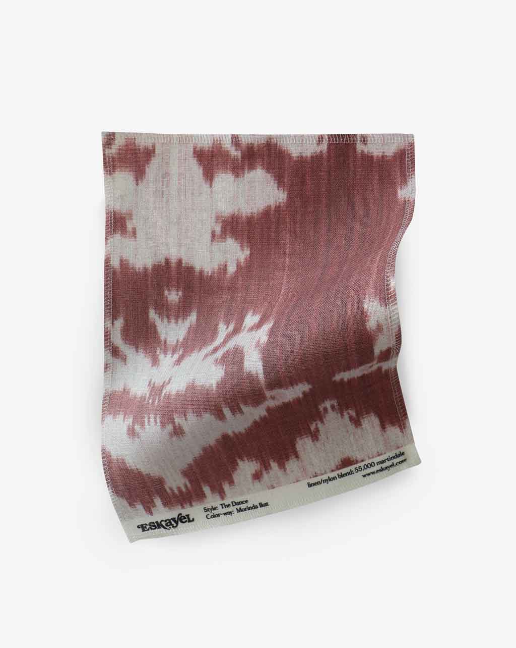 a pink and white Dance Fabric Sample Morinda Ikat pattern sample