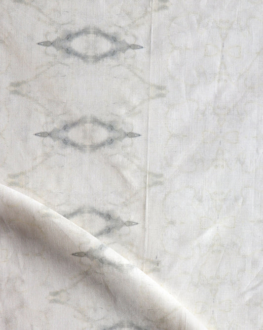 A luxury fabric from The Knitting Fabric Cloud in a white and gray colorway with a geometric pattern