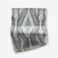 A piece of Ula Fabric Cerulean with a blue and white pattern on it made from high-end fabric