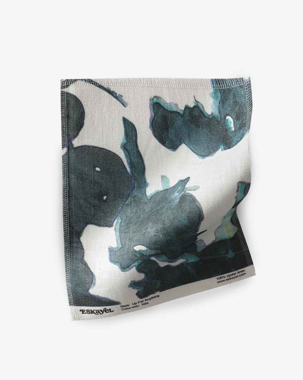 A Up For Anything Fabric with a botanical pattern in black and blue watercolor design.