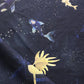 A close up of Water Signs Fabric Indigo with gold fish on it