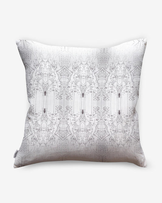 A white pillow with a luxurious fabric and an ornate Akimbo 1 Pillow||Greyscale design.