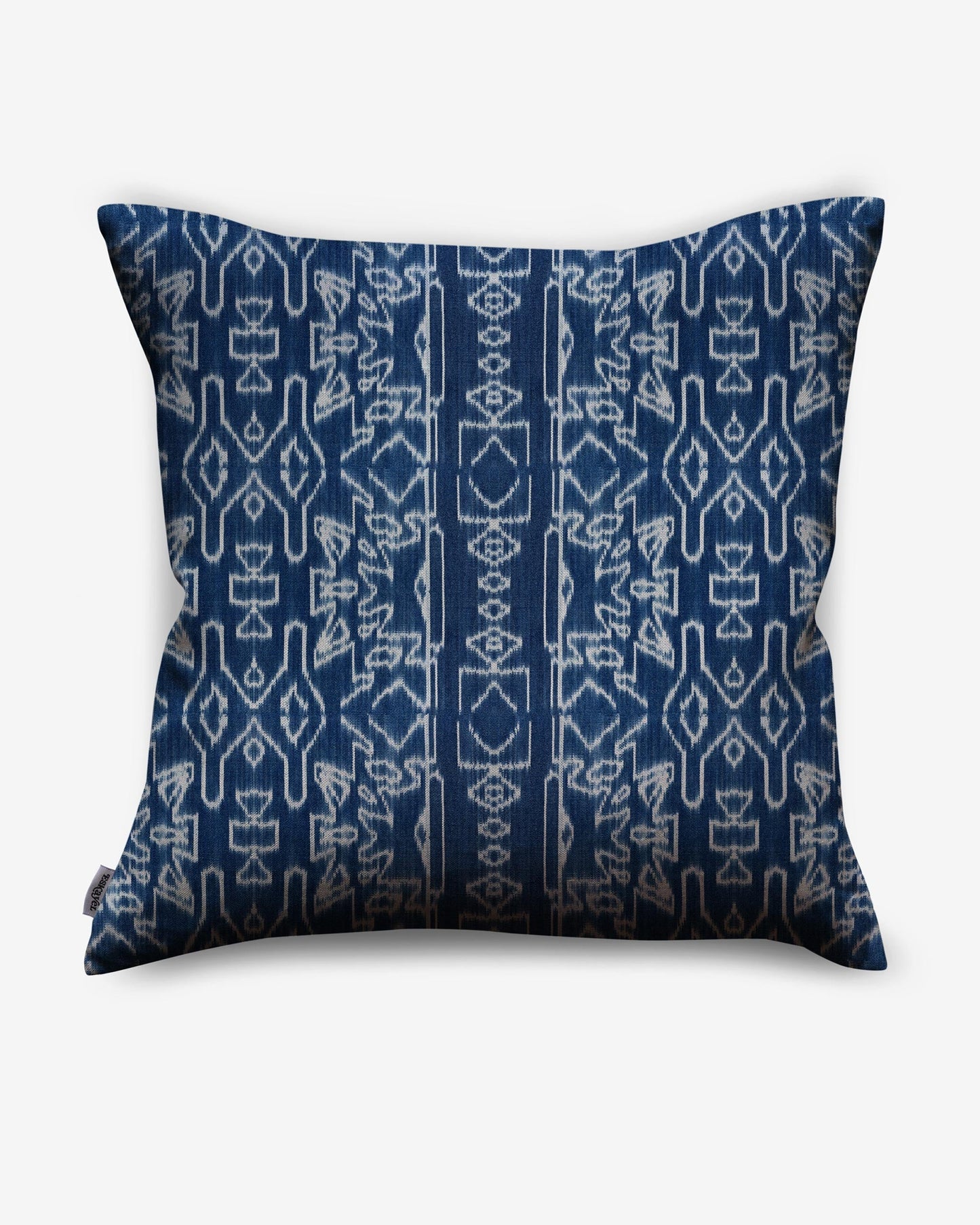 A pillow with a Akimbo Pillow Indigo Ikat design