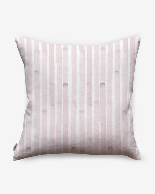 A luxurious Bamboo Stripe Pillow Coral with pink and white stripes of bamboo stripe