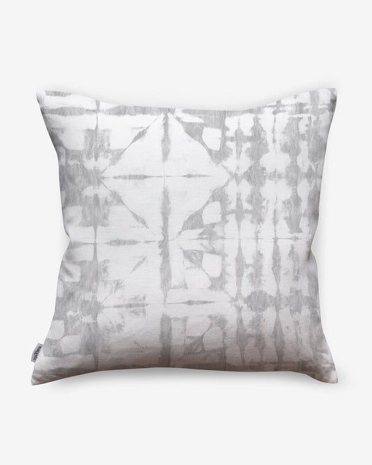 A gray Banda Pillow with an abstract design.
