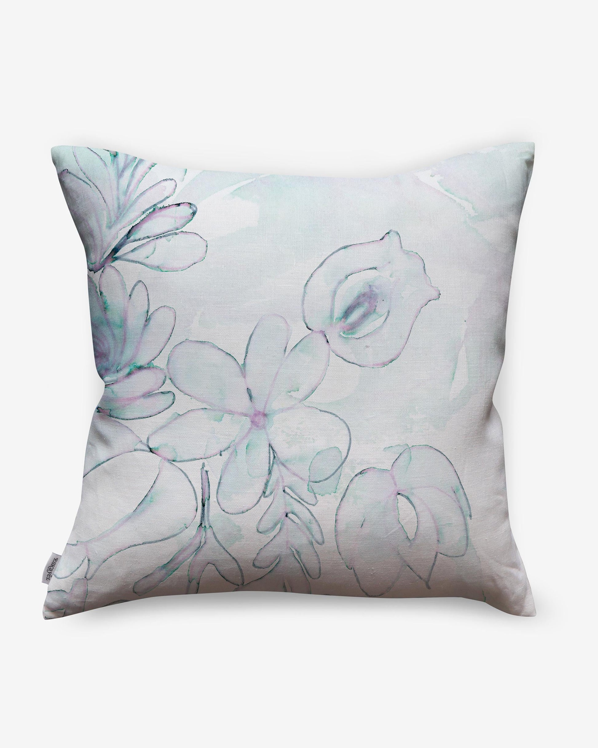 A Belize Blooms Pillow made from luxury fabric with a watercolor floral design inspired by Jardin Belize Blooms