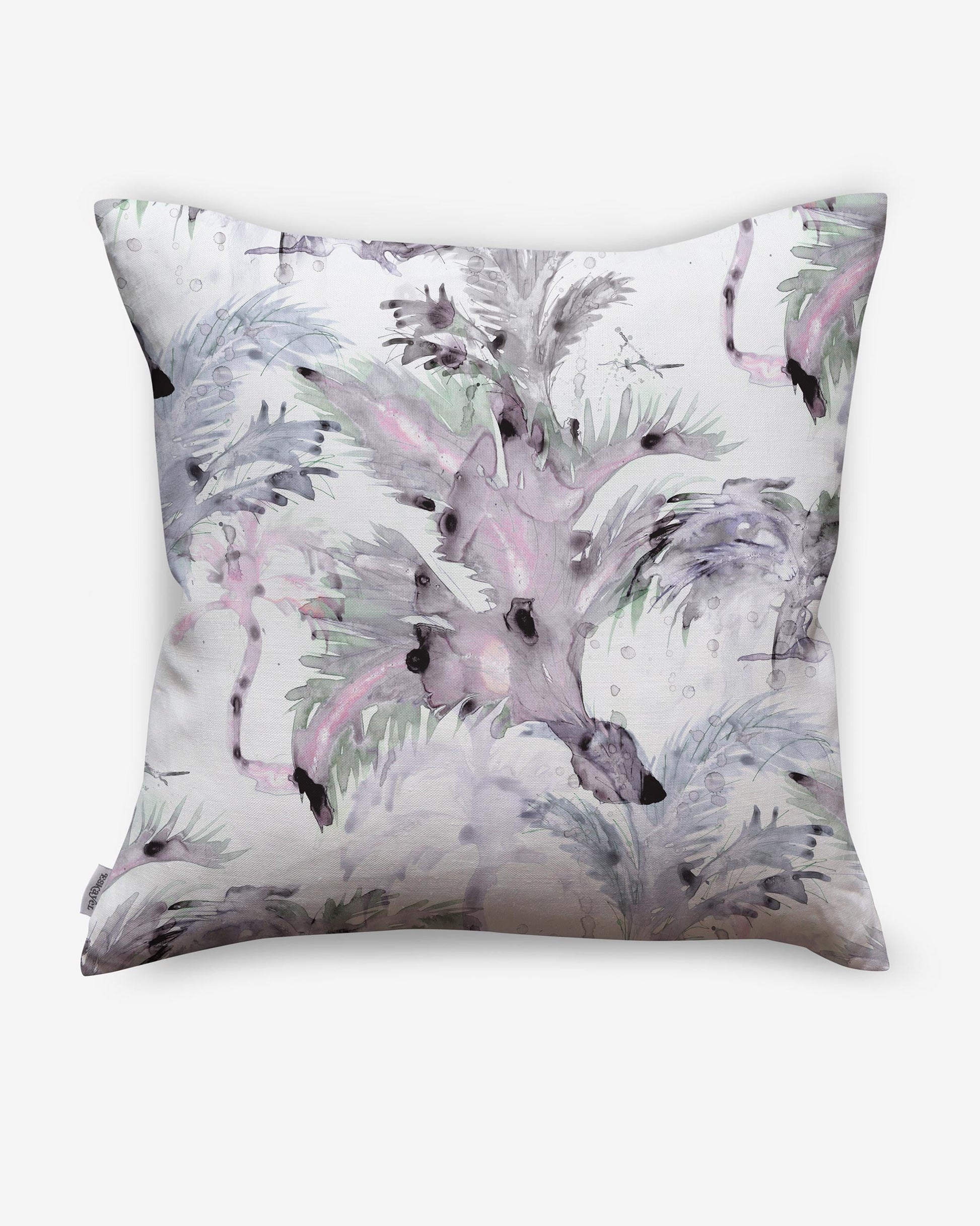 A Cocos Pillow Cay with a pink and purple flamingo print