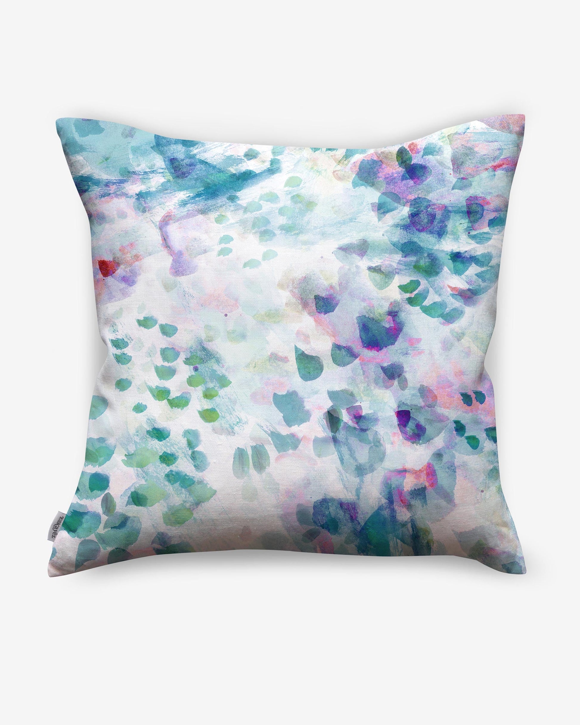 A Spectra pillow with vibrant pops of color and a Felidae pattern on luxury fabric