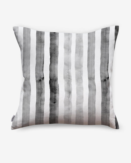 A Gradient Stripe Pillow Slate, creating a spectrum of tones