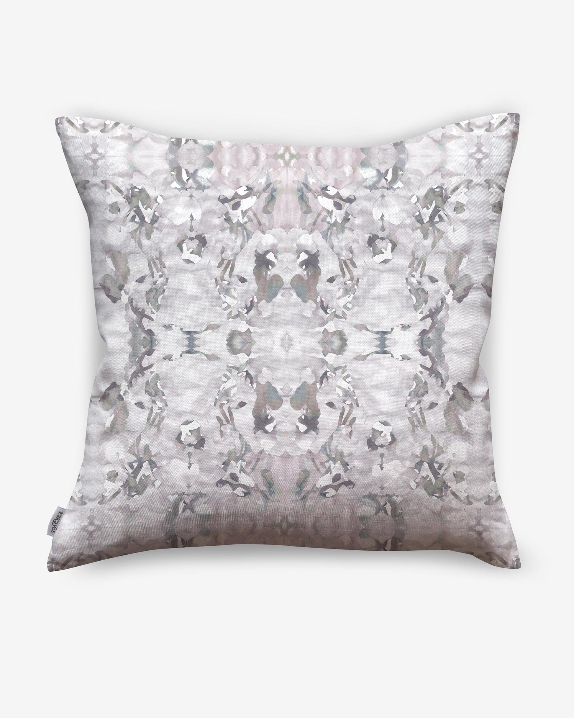 A Huerfano Pillow Ash with a high-end luxury fabric on it