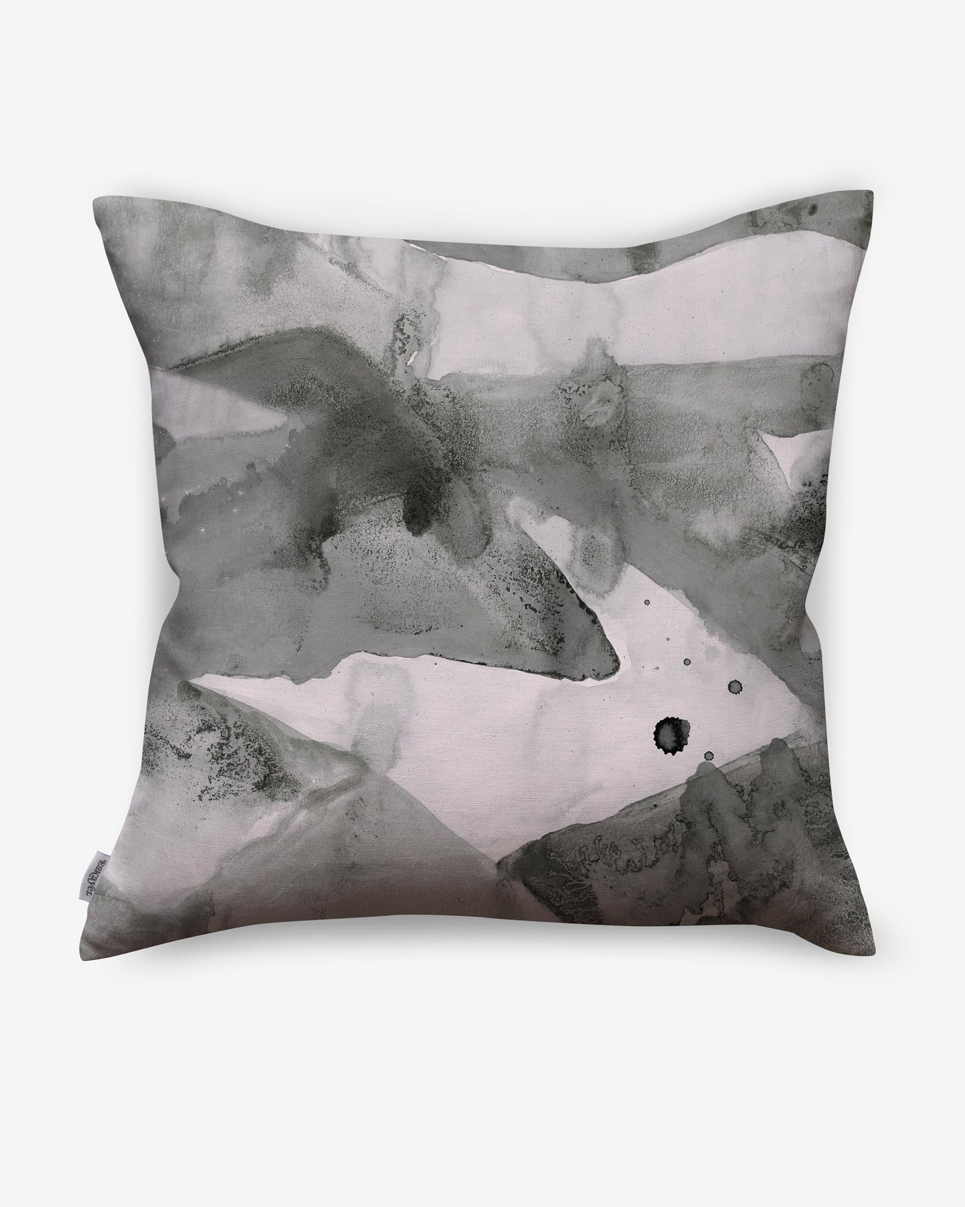 A Mani Pillow Phyllite with a painting on it