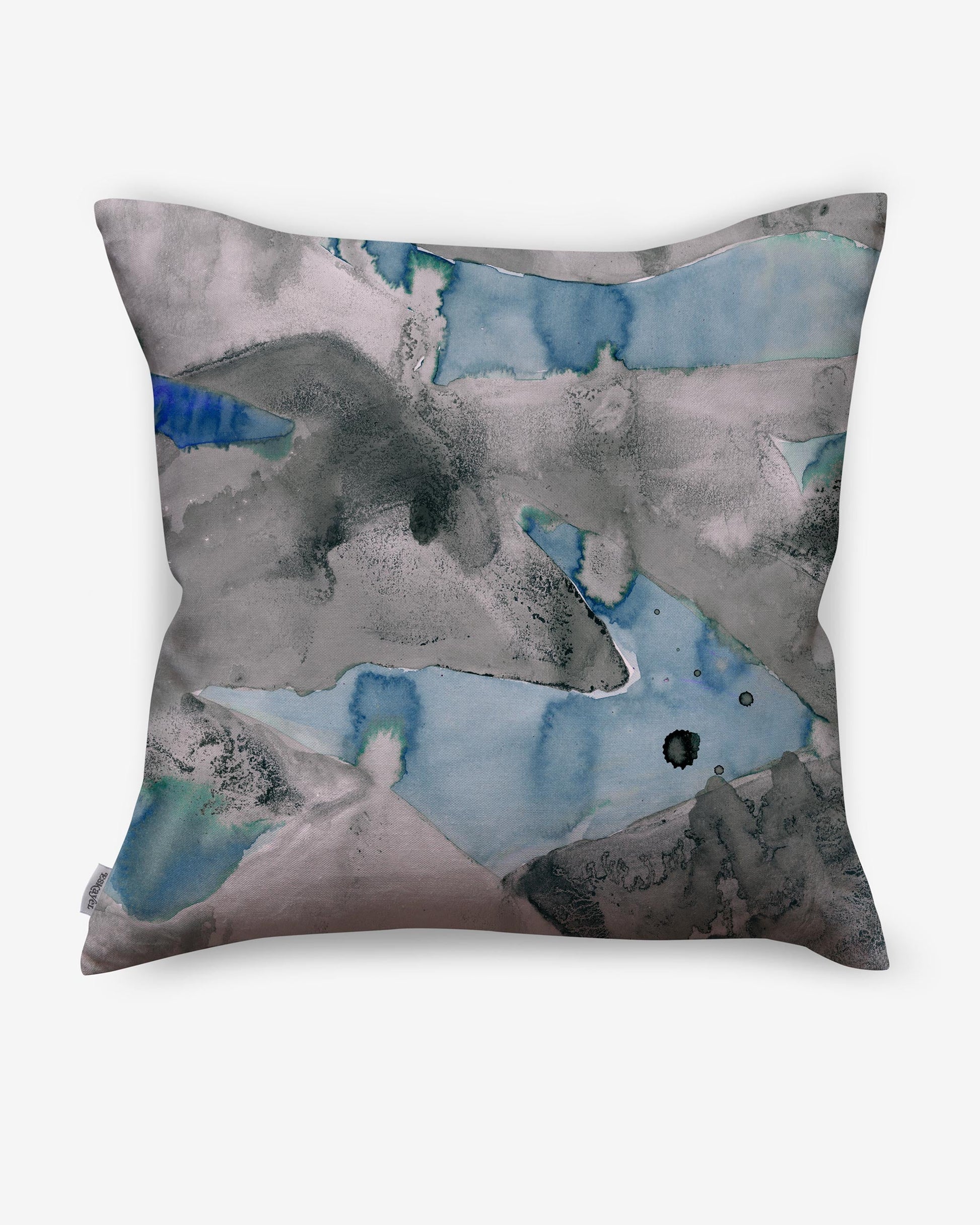 A Mani Pillow with an abstract painting on it