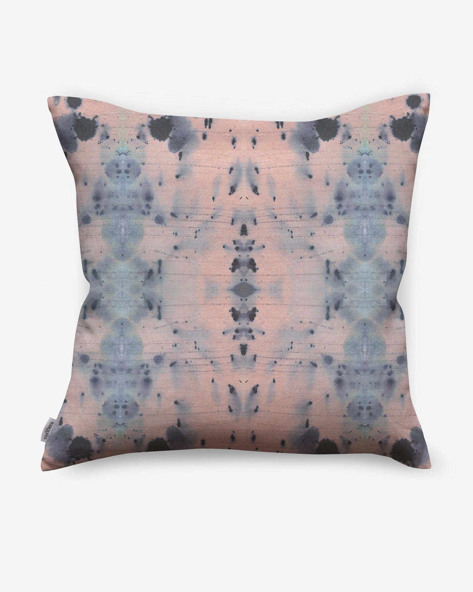 A luxurious Nairutya Pillow Citron from the Jangala Collection with a pink and blue design on it