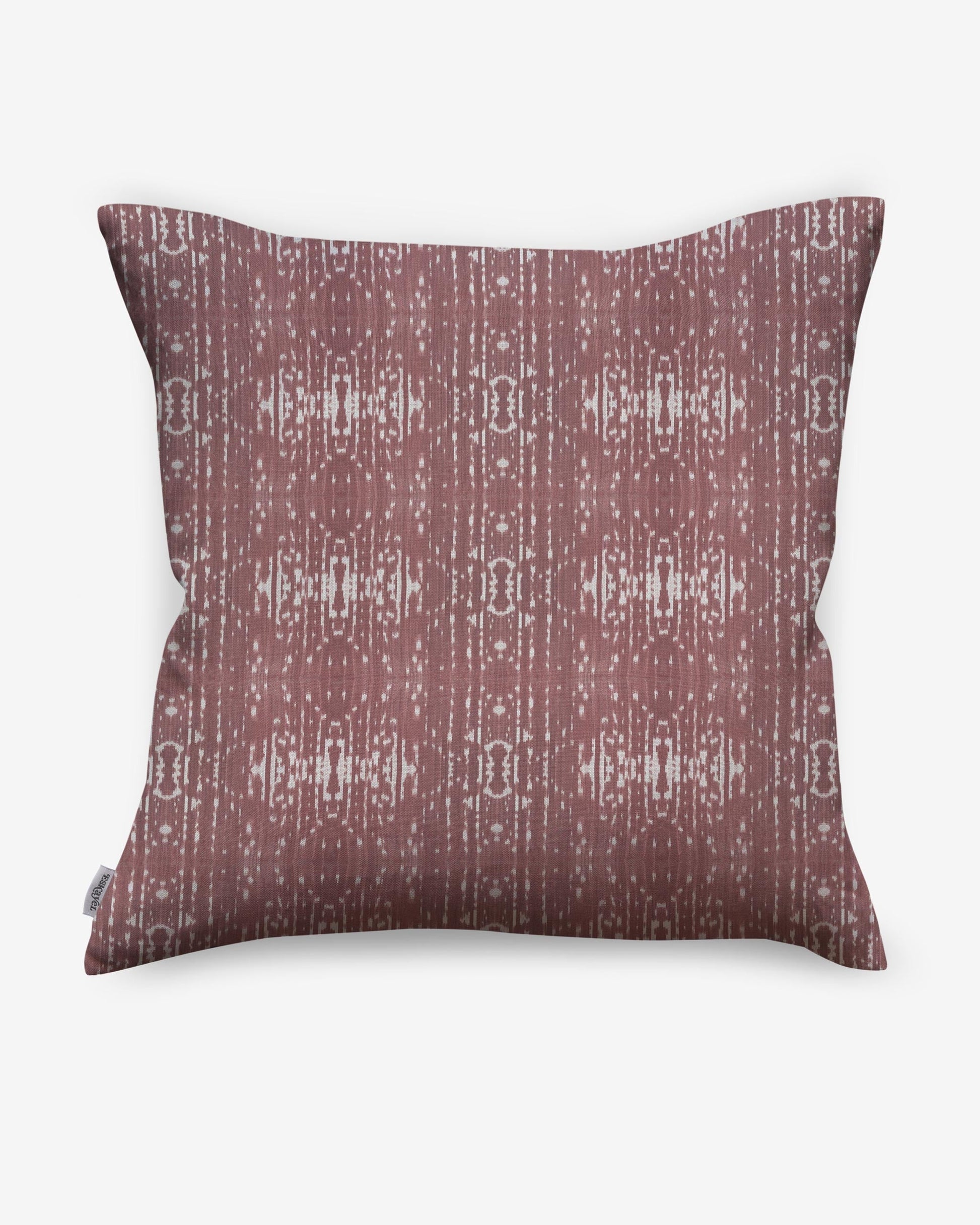 A Omaha Kinship Pillow Morinda Ikat with a maroon and white geometric pattern inspired by the Kwoma people of Papua New Guinea