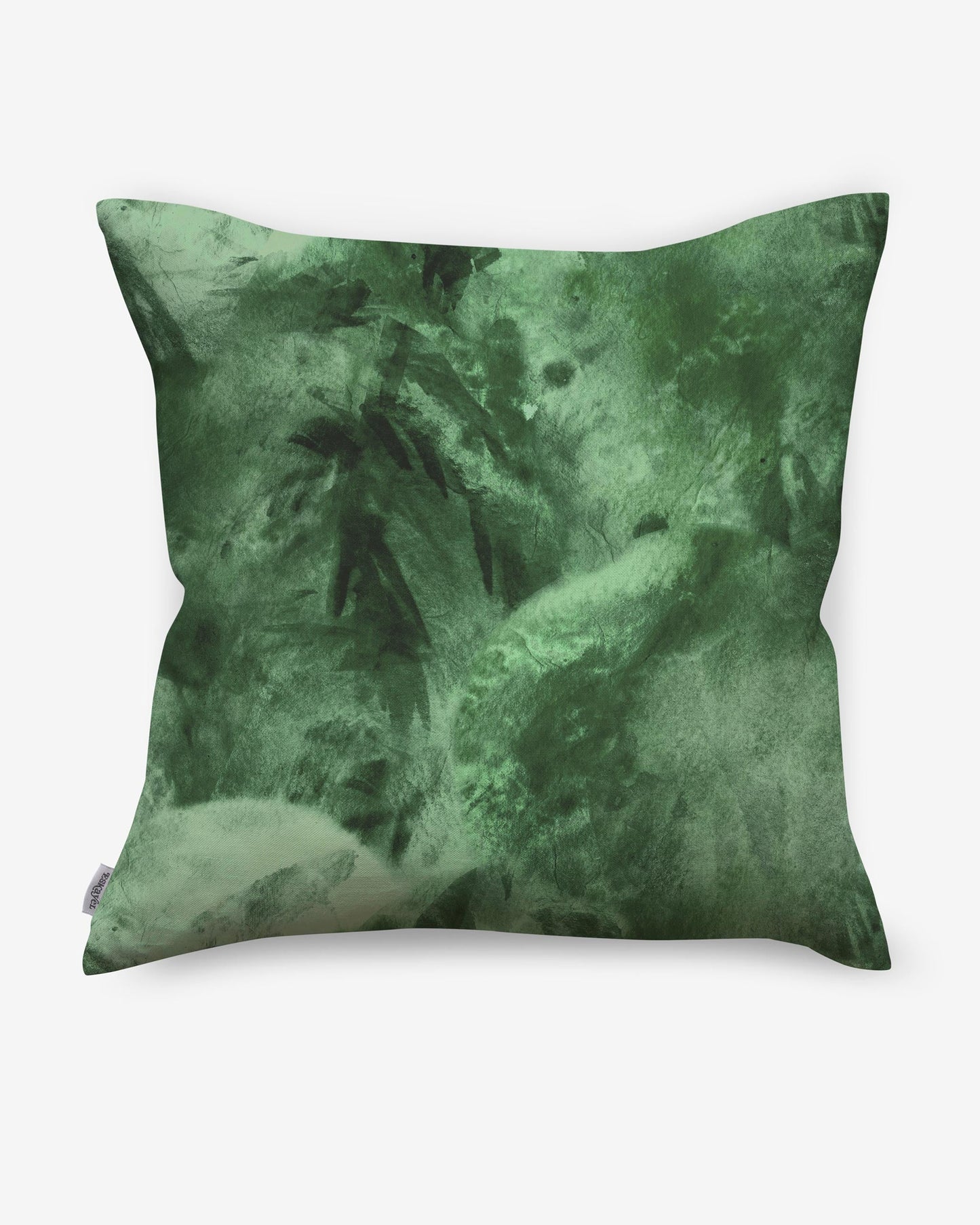 Description: A Palmeti Pillow Verde with a black background and fabric pattern