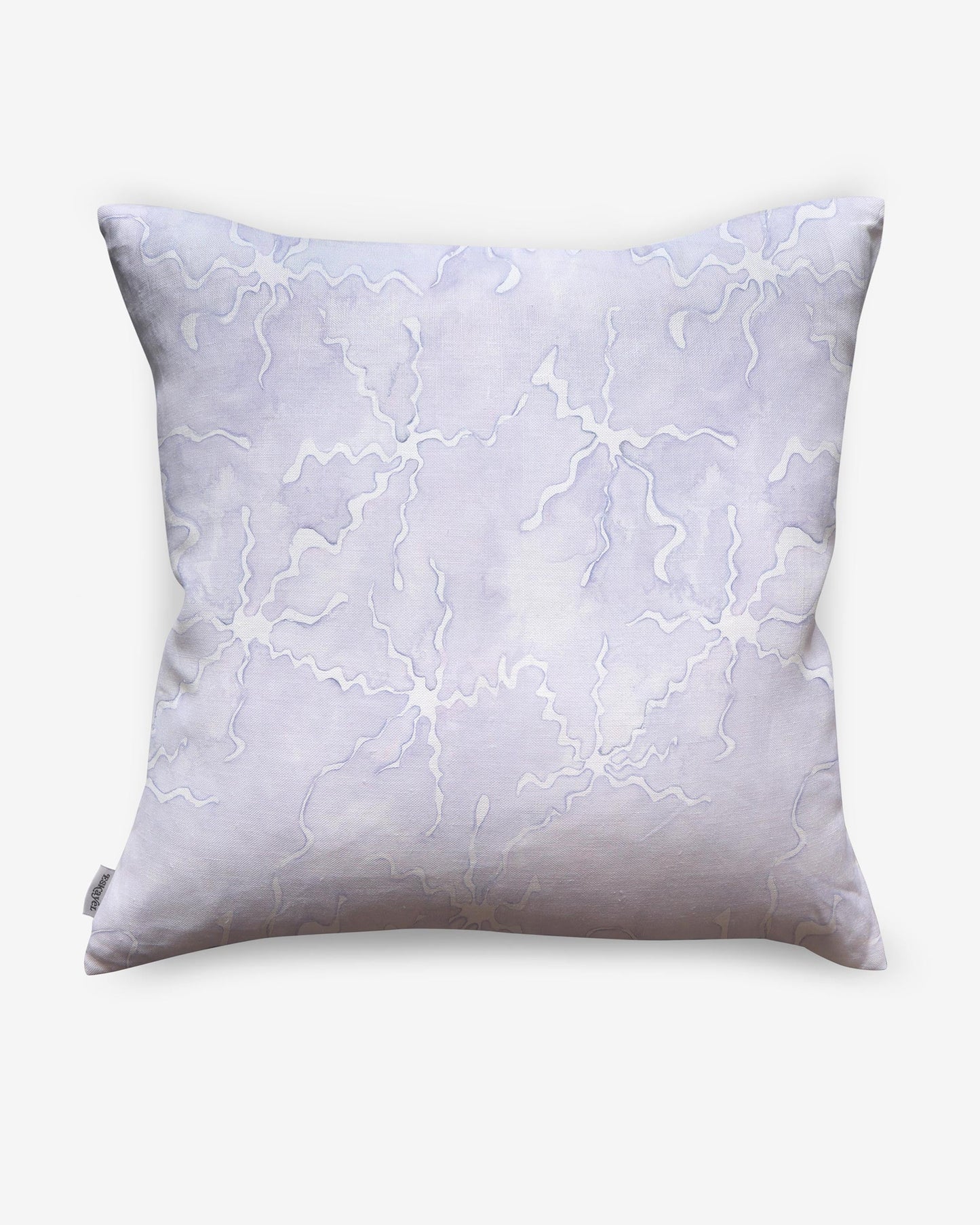 A Pecosa Pillow with a white and lavender resist dye techniques pattern