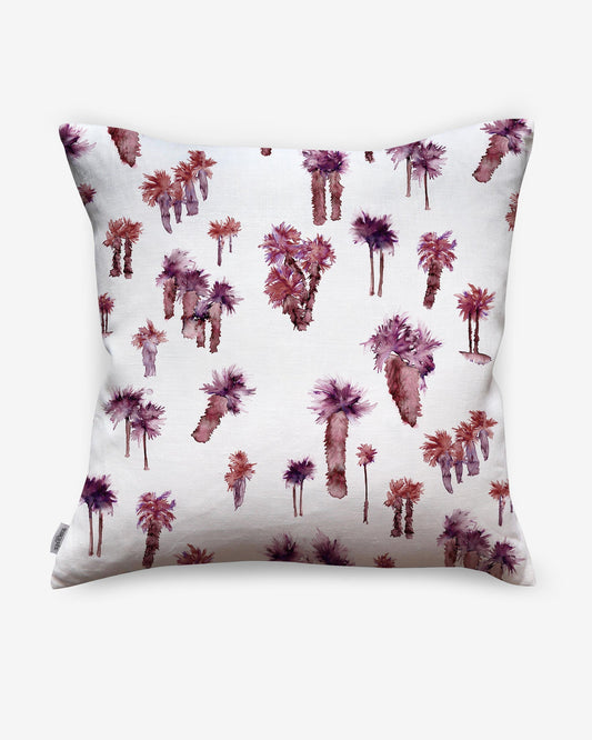 A Perfect Palm Pillow Persimmon, a luxury feather pillow with a watercolor style featuring palm trees on it