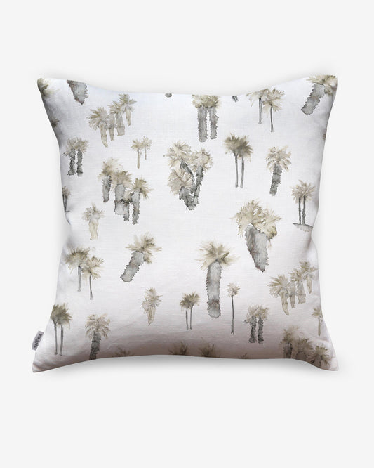 Modified Description: A white Perfect Palm Pillow adorned with palm trees, offering a touch of luxury with its feather filling