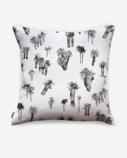 A black and white Perfect Palm Pillow Shadow with palm trees on it and a watercolor style