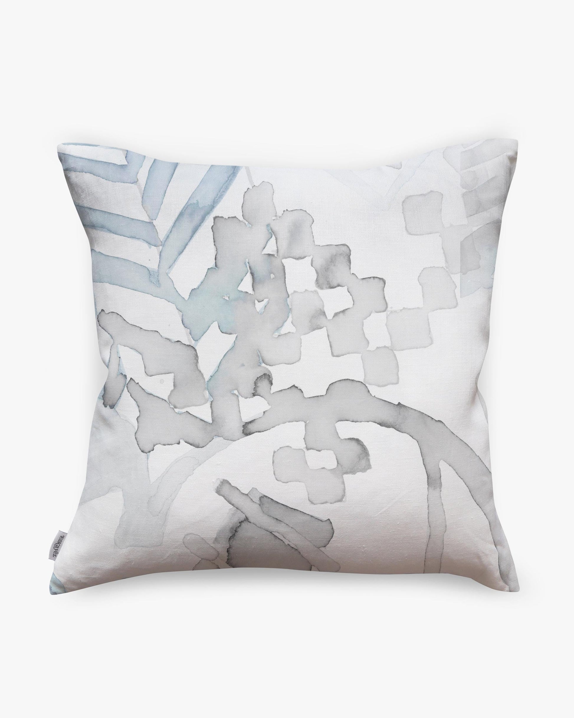 A Sea Galaxy Pillow with a blue and white Eskayel design on it