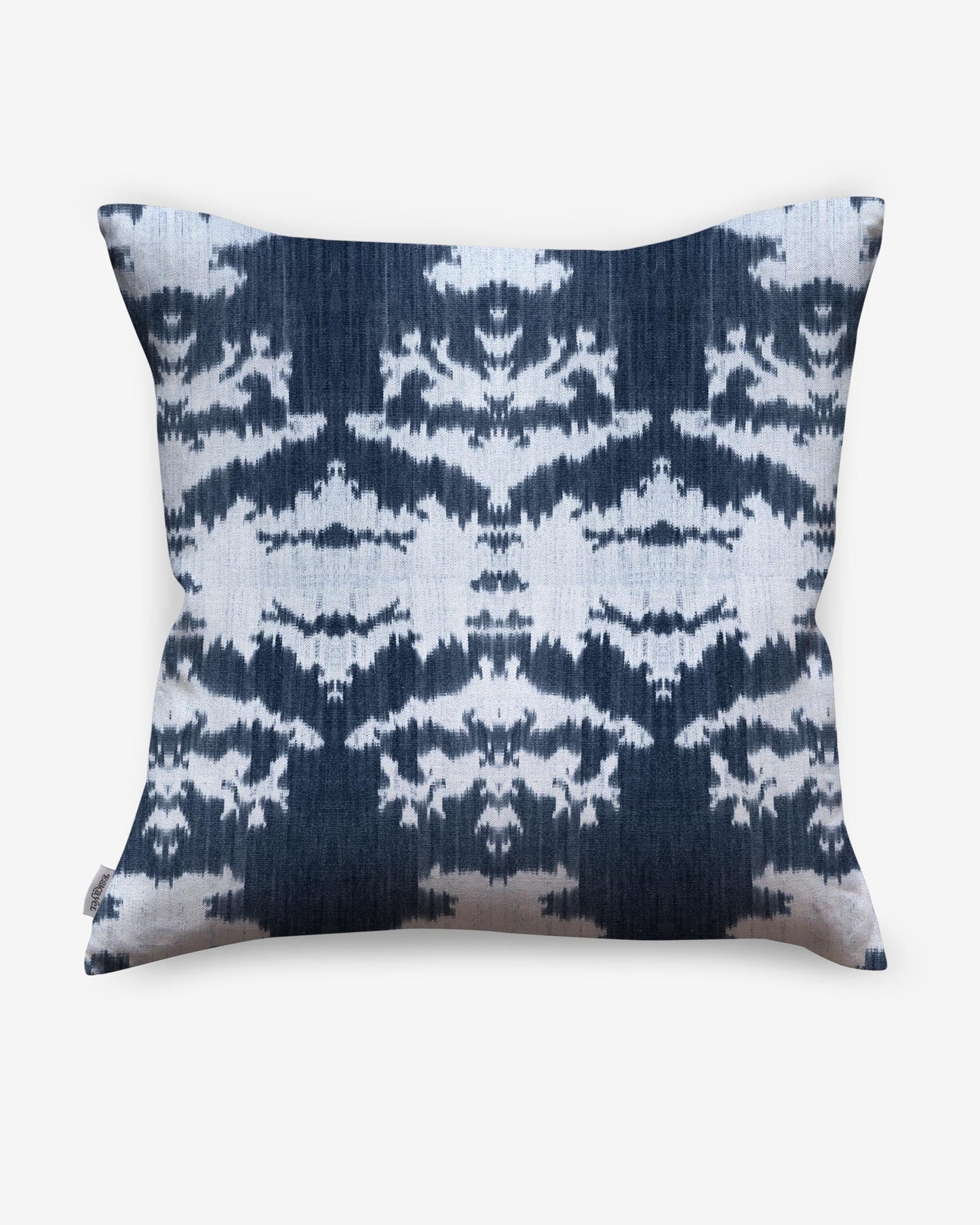 An indigo and white Dance Pillow Indigo Ikat from the Lora Collection with an abstract pattern