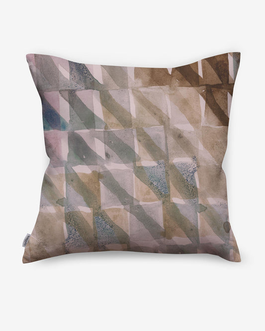 A Triangle Checks Pillow Camel with a geometric pattern on it