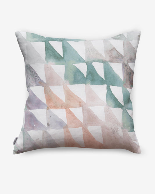 A Triangle Checks Pillow Reef with watercolor triangles in the Reef colorway