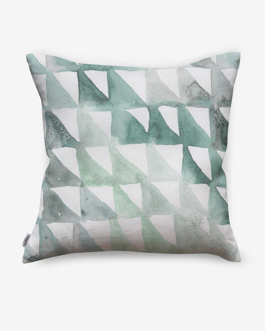 A Triangle Checks Pillow Verde with green and white triangles in the Verde colorway