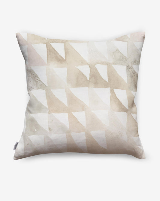 A Triangle Checks Pillow Sol with a beige and white geometric pattern