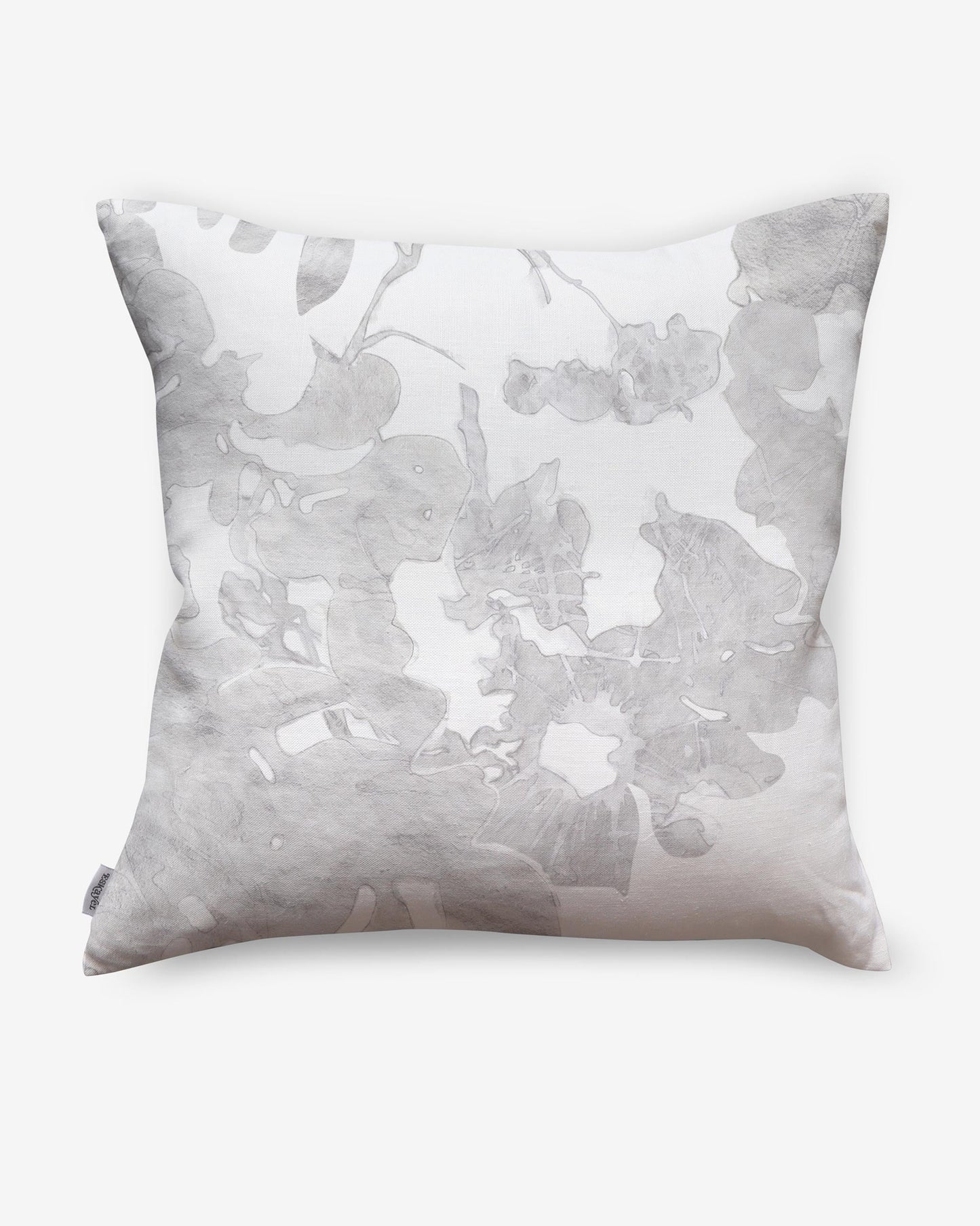 An Up For Anything Pillow Pearl with a watercolor botanical pattern design on it