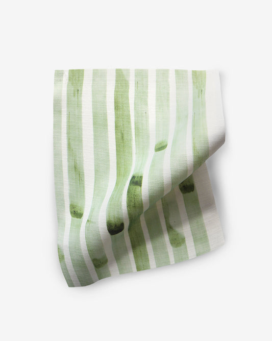 A Bamboo Stripe Performance Fabric Sample napkin on a white surface