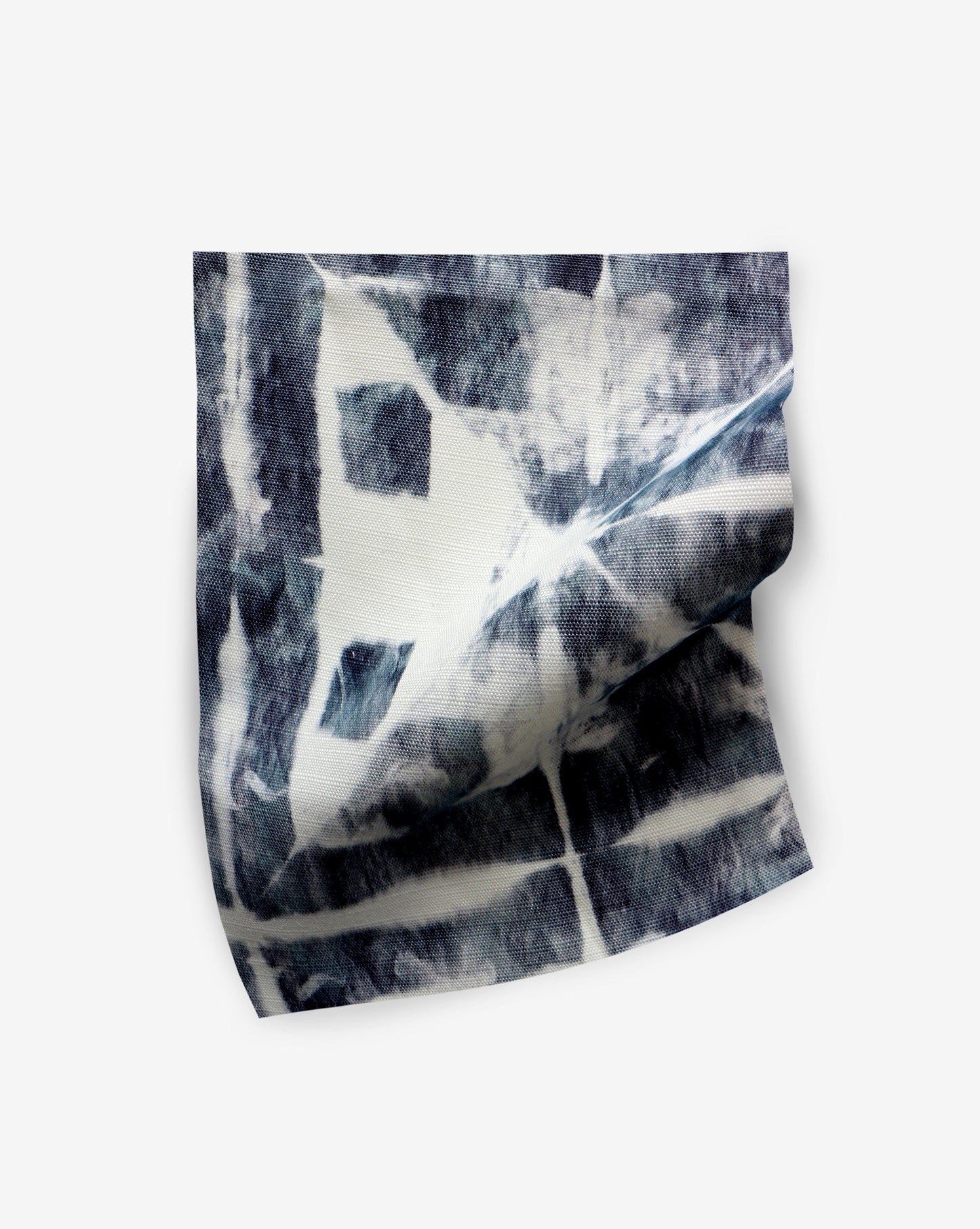 A piece of Banda Performance Fabric Midnight with a blue and white pattern, perfect for a Banda or Eskayel favorite