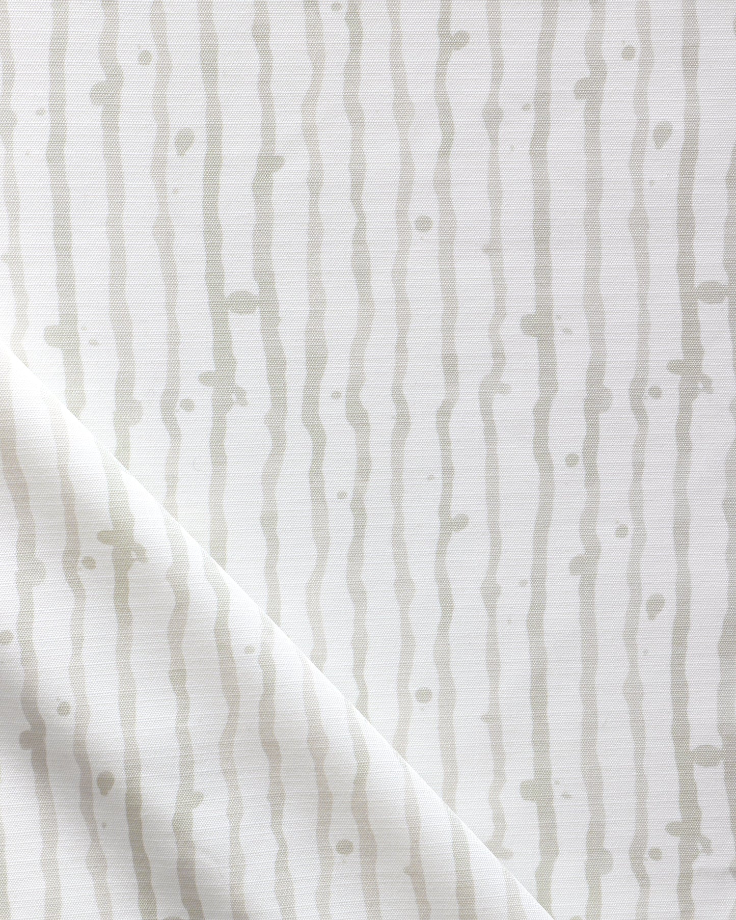 A white and gray Drippy Stripe Performance Fabric Sand