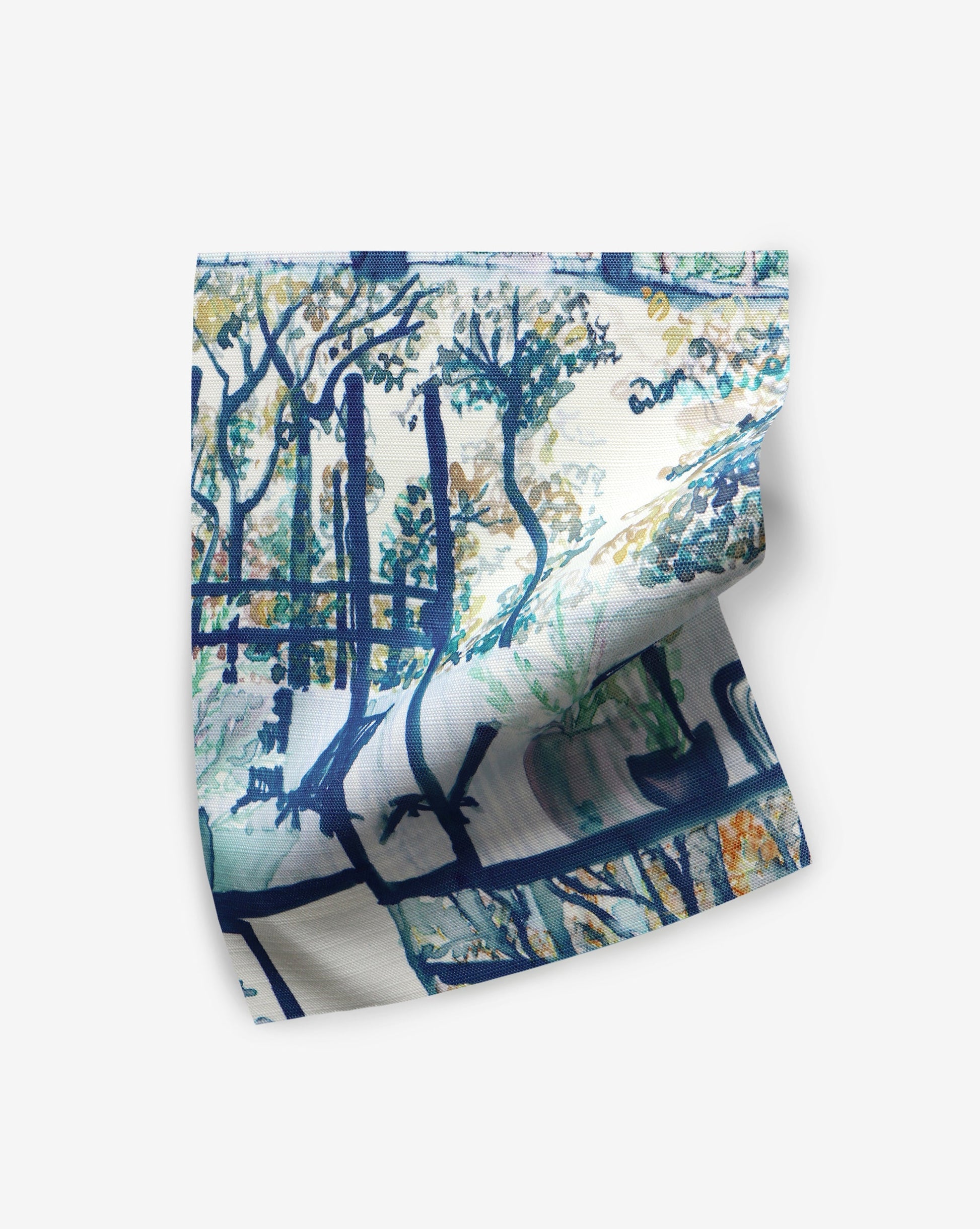 A blue and white painting on a piece of fabric featuring Quotidiana Performance Fabric Twilight pattern